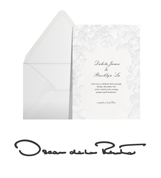 A white-on-white floral Oscar de la Renta invitation, envelope, and logo.